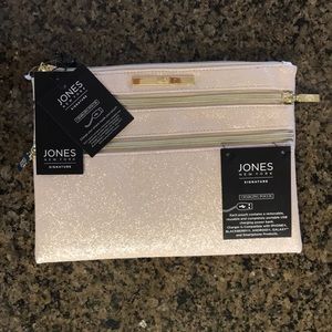 Tan/gold clutch with portable USB charging pack